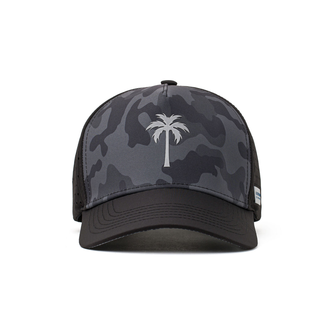 Front view of a black hat with a white palm tree logo, dark camo design, and water-repellent fabric for durability during active wear.