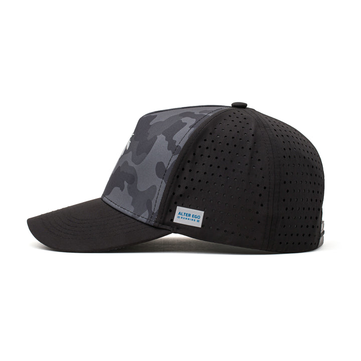 Side view of a black and camo hat featuring a white palm tree emblem, lightweight fabric, and a curved brim for comfortable outdoor activities.