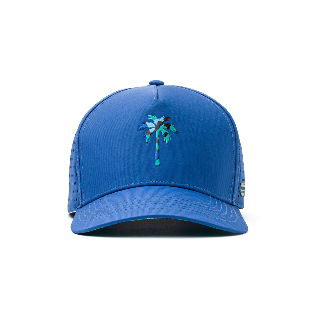 Front view of a blue athletic hat with a bold green palm tree emblem, curved brim, and water-repellent fabric for active lifestyles.